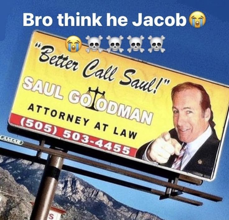 a billboard with an image of a man pointing to the side