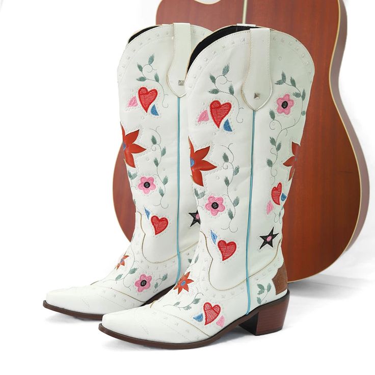 Experience the perfect blend of rugged and feminine with our Cowboy High Boots! These boots feature elegant embroidered flowers and hearts, giving you the best of both worlds. Made with high-quality materials, you'll have durable, stylish boots for any adventure. Elevate your western look with our Cowboy High Boots. Size Preference: Size 33=215mm=8.46inch(bare feet length) Size 34=220mm=8.66inch(bare feet length) Size 35=225mm=8.86inch(bare feet length) Size 36=230mm=9.06inch(bare feet length) S Daisy Cowboy Boots, Custom Cowgirl Boots, Cowboy Boots Drawing, Boot Pattern, Custom Cowboy Boots, Flower Boots, Flowers And Hearts, Floral Boots, Embroidered Boots