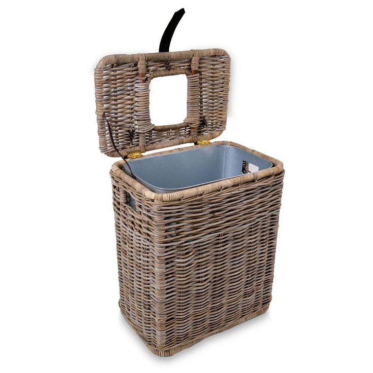 a wicker laundry basket with lid and handle on the bottom is shown in front of a white background