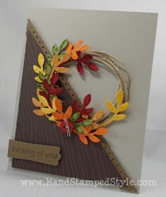 a handmade card with an autumn wreath on it