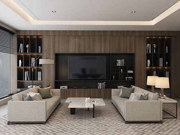 a living room with couches, tables and a television on the wall in front of it