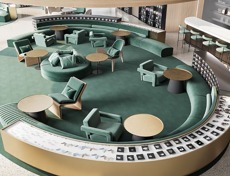 a circular seating area with tables and chairs