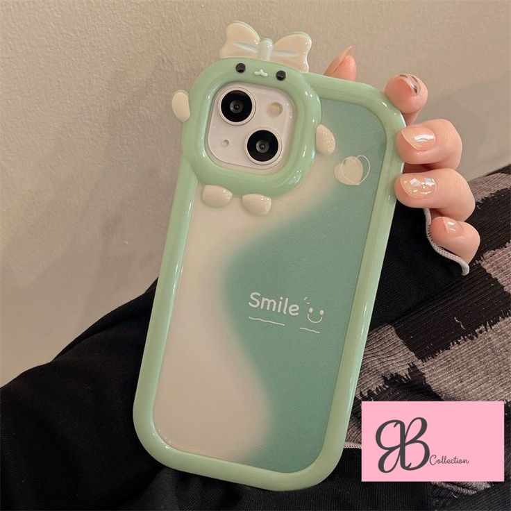 a person holding up a phone case with an animal on it