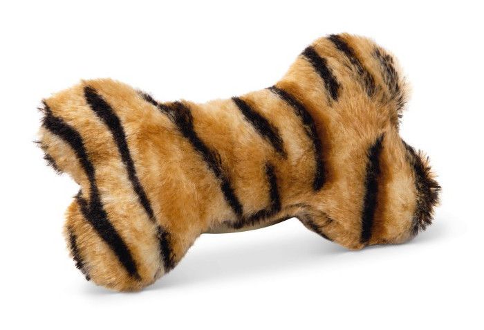 a stuffed animal that is laying down on the white ground with black and brown stripes