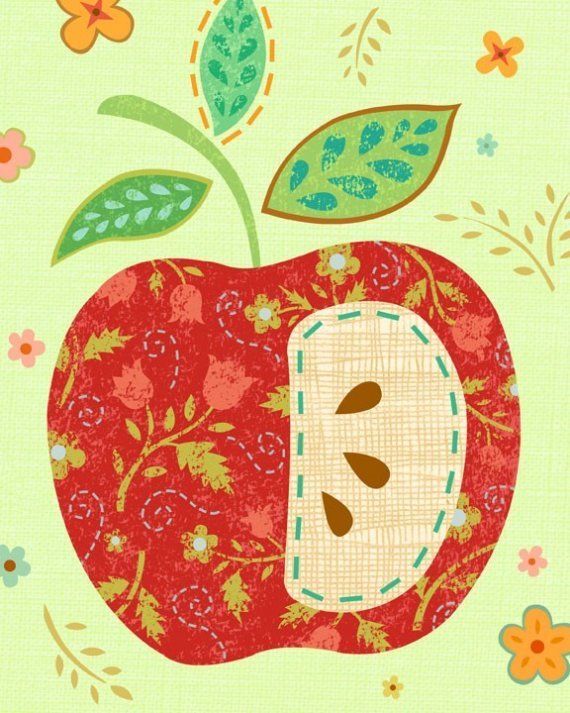 an apple with leaves and flowers on it