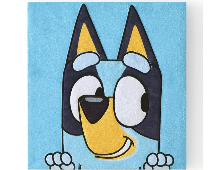 a cartoon dog painted on a blue background