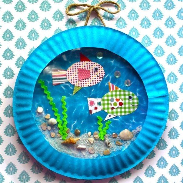 a paper plate with some fish on it