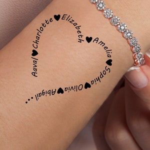 a woman's arm with the words i love you written in black on it