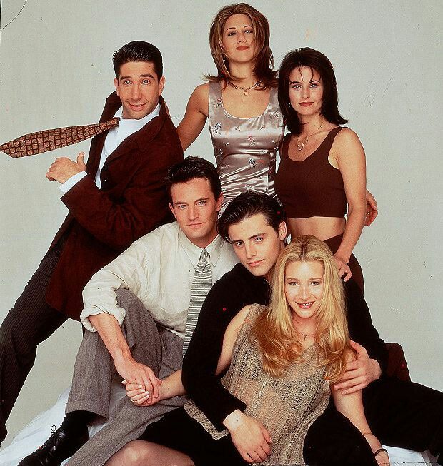 the cast of friends posing for a photo