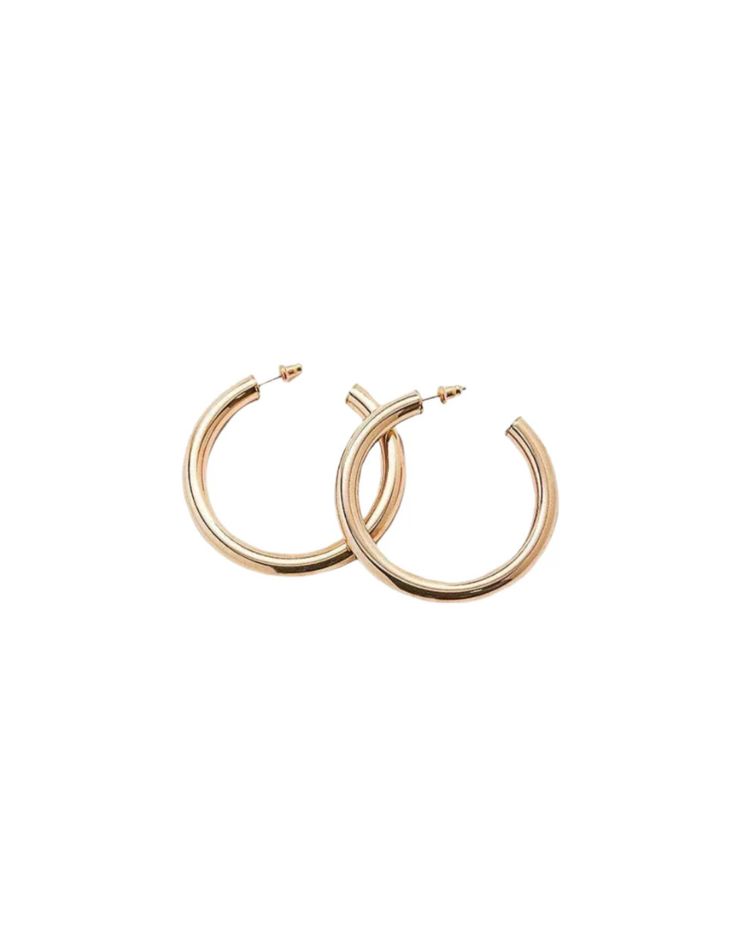 A BOLD STAPLE WHAT IT IS: A classic pair of thick gold hoop earrings WHY IT'S SPECIAL: They're a staple you need in your wardrobe Lightweight, comfortable, easy to wear GOOD TO KNOW: Gold plated Dimensions: approx. 6mm x 50mm Hypoallergenic WHY WE LOVE ADMIRAL ROW: Made in the USA, woman founded and black-owned, Admiral Row has a story to tell and we’re here for it. We love their commitment to creating responsible, accessible jewelry and their designs are the wardrobe staples of our dreams.