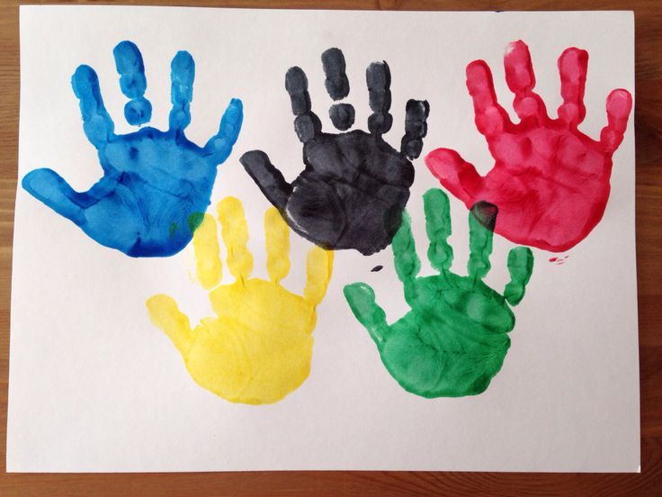 three handprints are shown on a piece of paper that has been made to look like children's hands