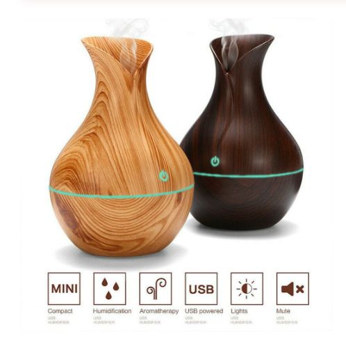 Let a warm mist, with your choice of oil aroma, flow out and humidify any room in your home: bedroom, living room, office. This decorative aromatherapy product will moisturize the air and relieve stress with the right oil. Automatic shut off with low water level Lasts up to 8 hours Color Choices: Light wood/ Dark wood Blue LED light Humidifier Capacity: 4.4 oz (150 ml) Spray Volume: 1 oz/hour Area Reach: 30-92 sq ft Plug Type: USB Item Size: 3.8 inches wide x 3.8 inches high NOTE: this is a mini Mini Diffuser, Aromatherapy Humidifier, Humidifier Essential Oils, Aroma Essential Oil, Led Color Changing Lights, Cool Mist Humidifier, Air Humidifier, Color Changing Led, Aroma Diffuser