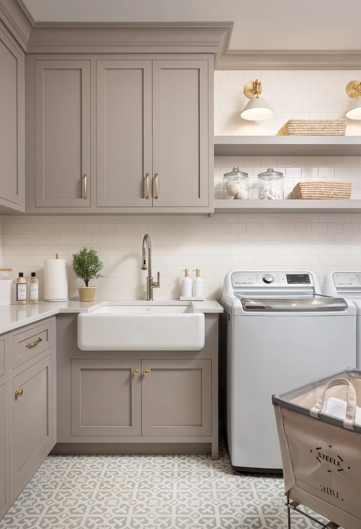 the kitchen is clean and ready to be used as a washer and dryer