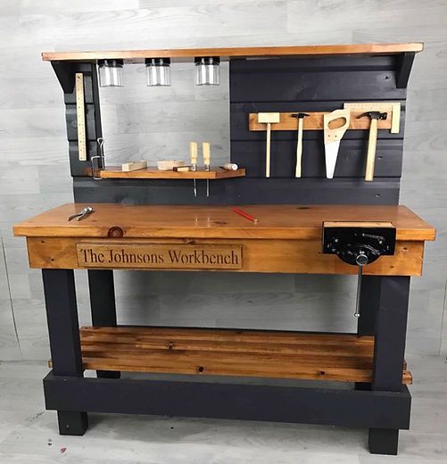 a workbench with various tools on it