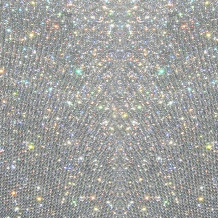 silver glitter fabric with white and blue stars on the top, as seen from above