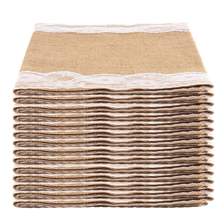 a stack of brown and white knitted placemats