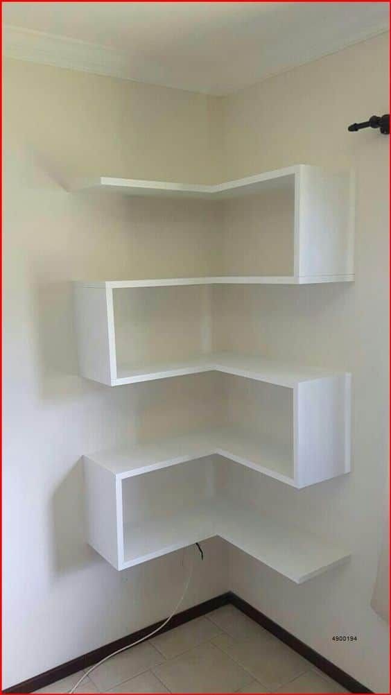 empty shelves in the corner of a room