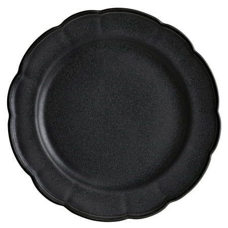 an empty black plate on a white background