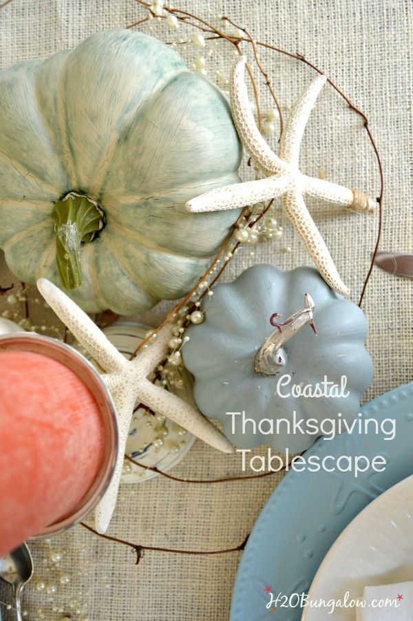 coastal thanksgiving tablescape with starfish and pumpkins