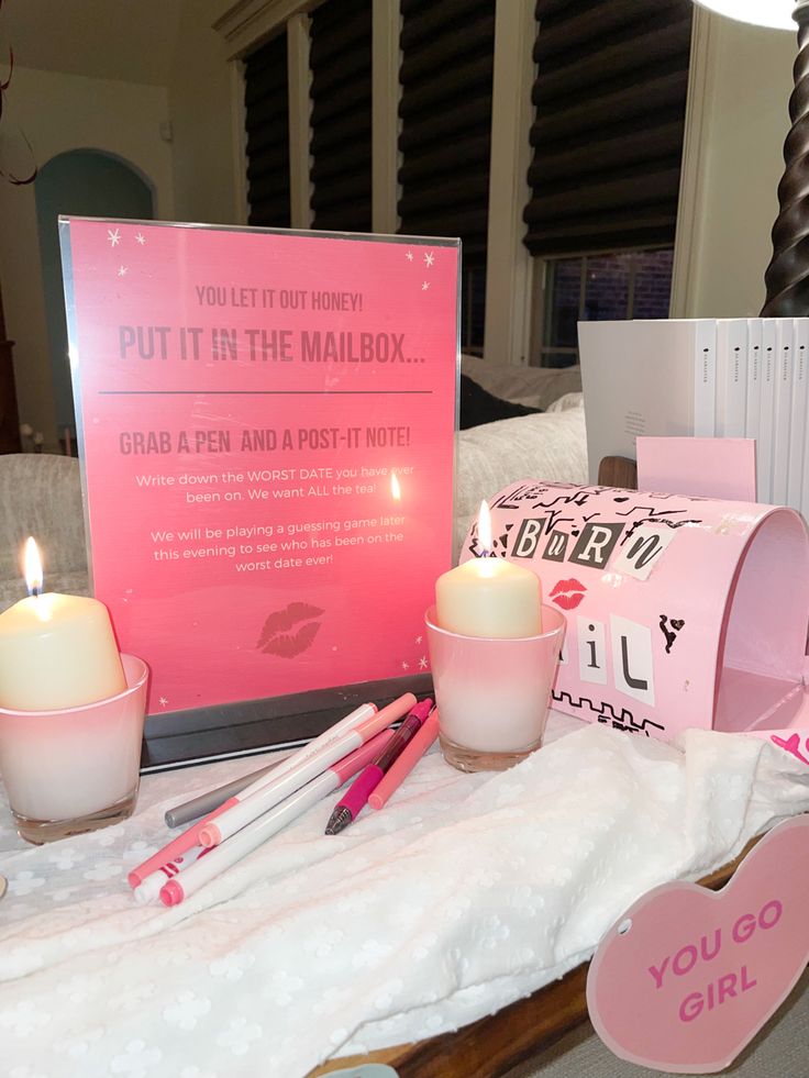 a table topped with candles and other items