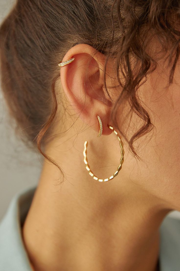 An uninhibited hoop meant to match your expressive attitude. Solid on its own, or as the perfect layering piece to your ear game. Style Inspiration Minimalist, Pave Ear Cuff, Radial Pattern, Sterling Silver Jewelry Earrings, Double Piercing, Earrings Aesthetic, Diy Jewlery, Dark Side Of The Moon, Sterling Jewelry