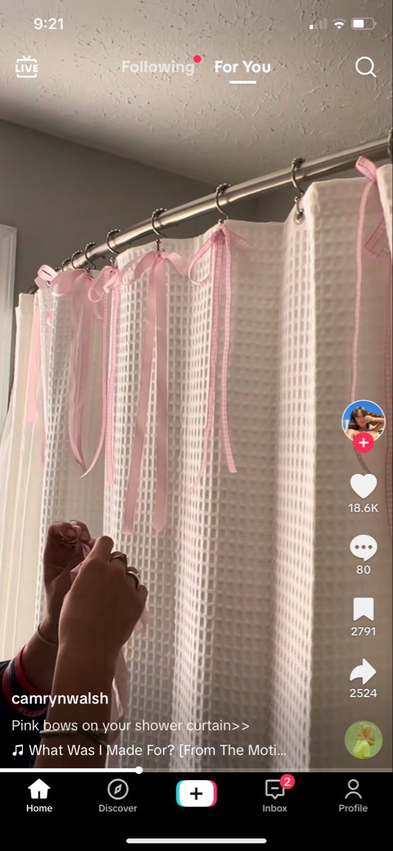 someone is taking a photo in front of the shower curtain with their feet on the shower