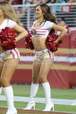 the cheerleaders are performing on the field