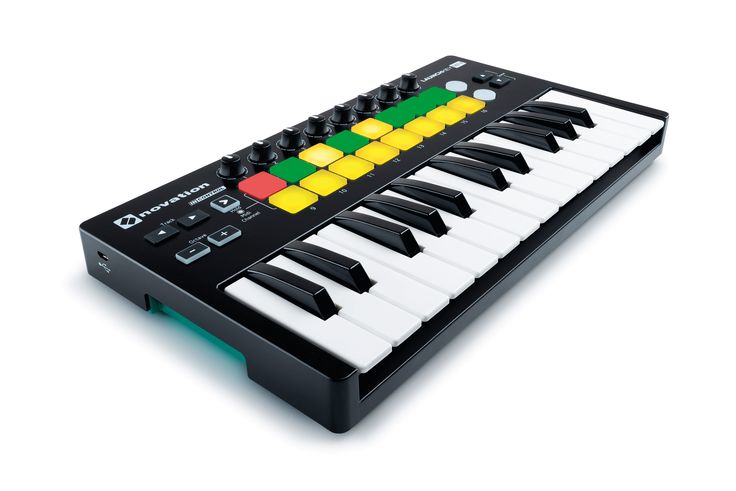 an electronic keyboard with multicolored keys on the front and back sides, sitting in front of a white background