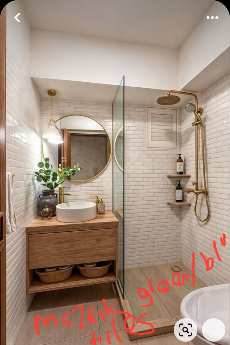 a bathroom with a sink, mirror and shower stall in it's own home