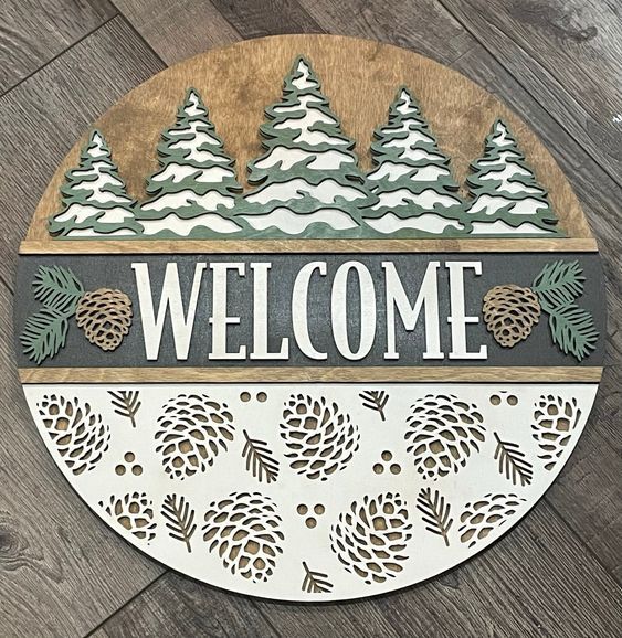 Laser Cut Christmas Ideas Holiday Laser Projects, Wooden Laser Crafts, Winter Door Rounds, Christmas Wood Crafts Diy Wooden Signs, Door Round Signs, Laser Cut Door Hanger, Unique Door Hangers, Holiday Door Signs, Winter Door Signs