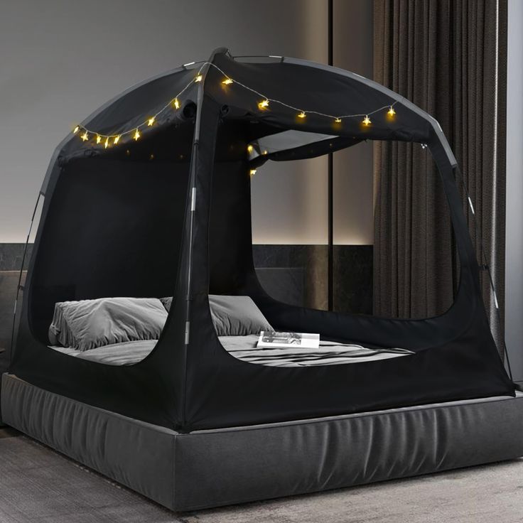 a bed with lights on it in a room