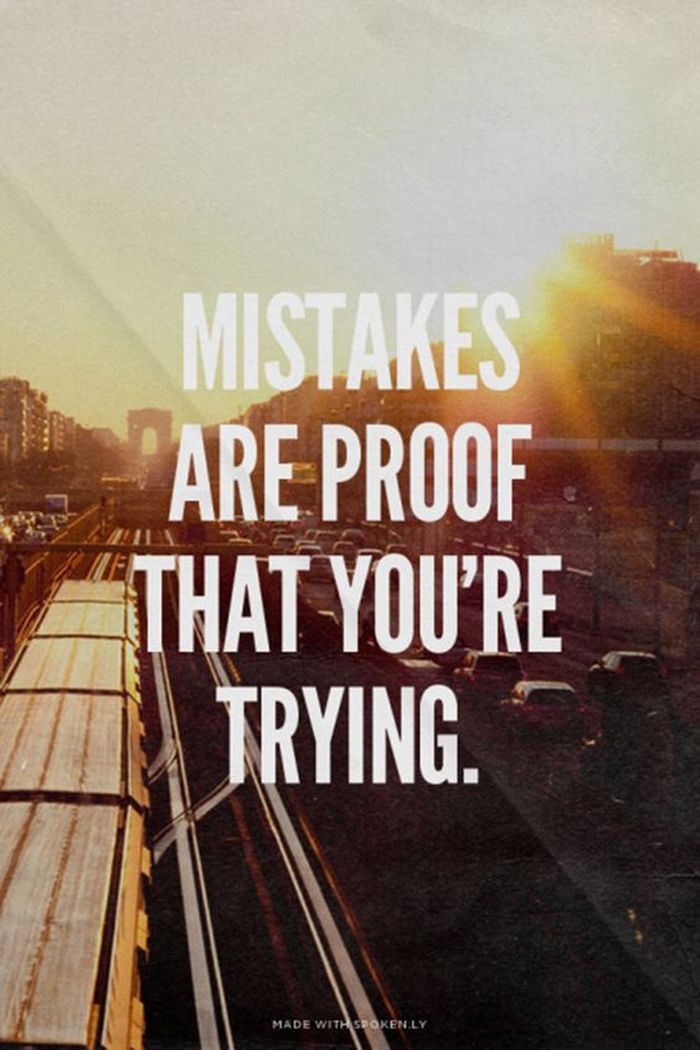 a train traveling down tracks with the words, mistakes are proof that you're trying