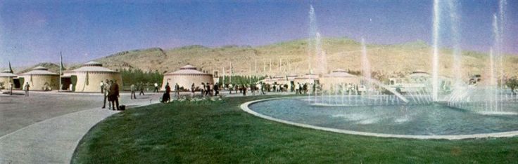 an artist's rendering of a fountain in the middle of a park