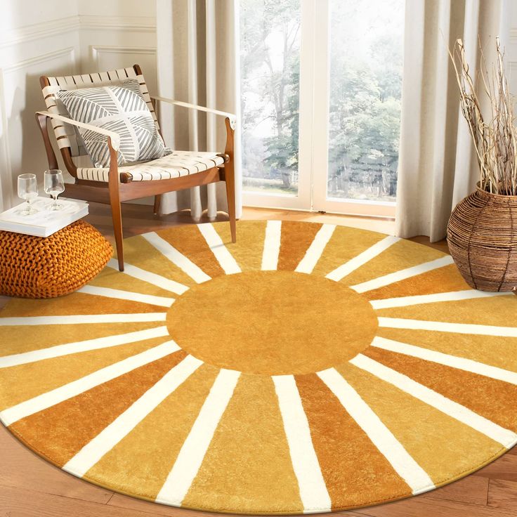 an orange and white rug in a living room with a chair, window, and potted plant