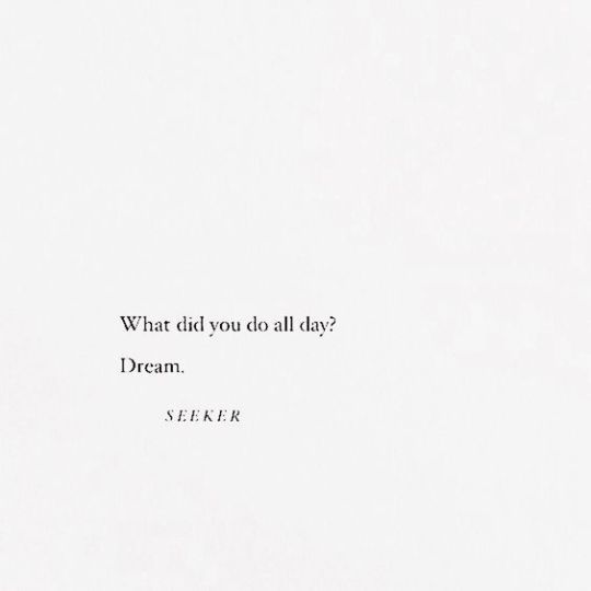 a white wall with a quote on it that says, what did you do all day? dream