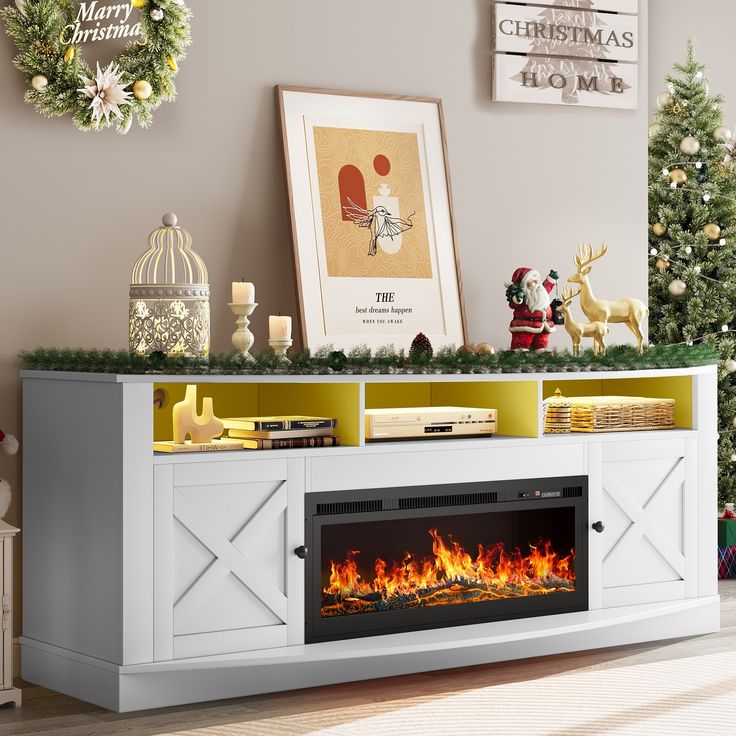 an entertainment center with a fireplace and christmas decorations