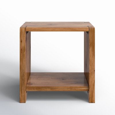 a small wooden table with one shelf on the side