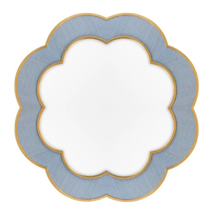 a blue and gold plate with an oval shape