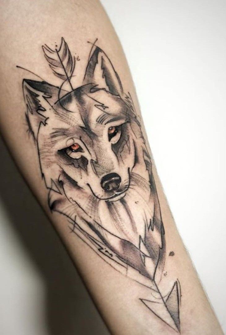 a black and white photo of a fox with an arrow tattoo on the left arm