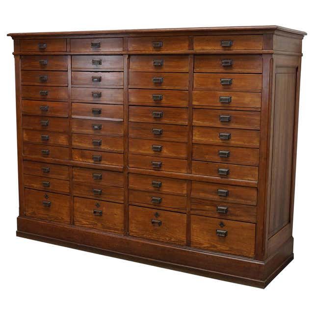 a large wooden dresser with many drawers