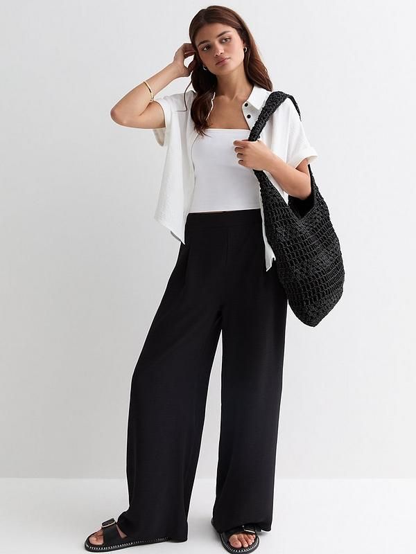 Loose Black Pants Outfit, Loose Black Pants, Black Pants Outfit, Trousers Women Wide Leg, Sixth Form, Black Wide Leg Trousers, Loose Trousers, High Leg Boots, Fashion Furniture