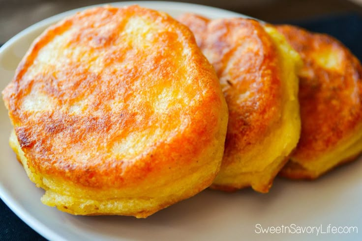 two small pancakes on a white plate