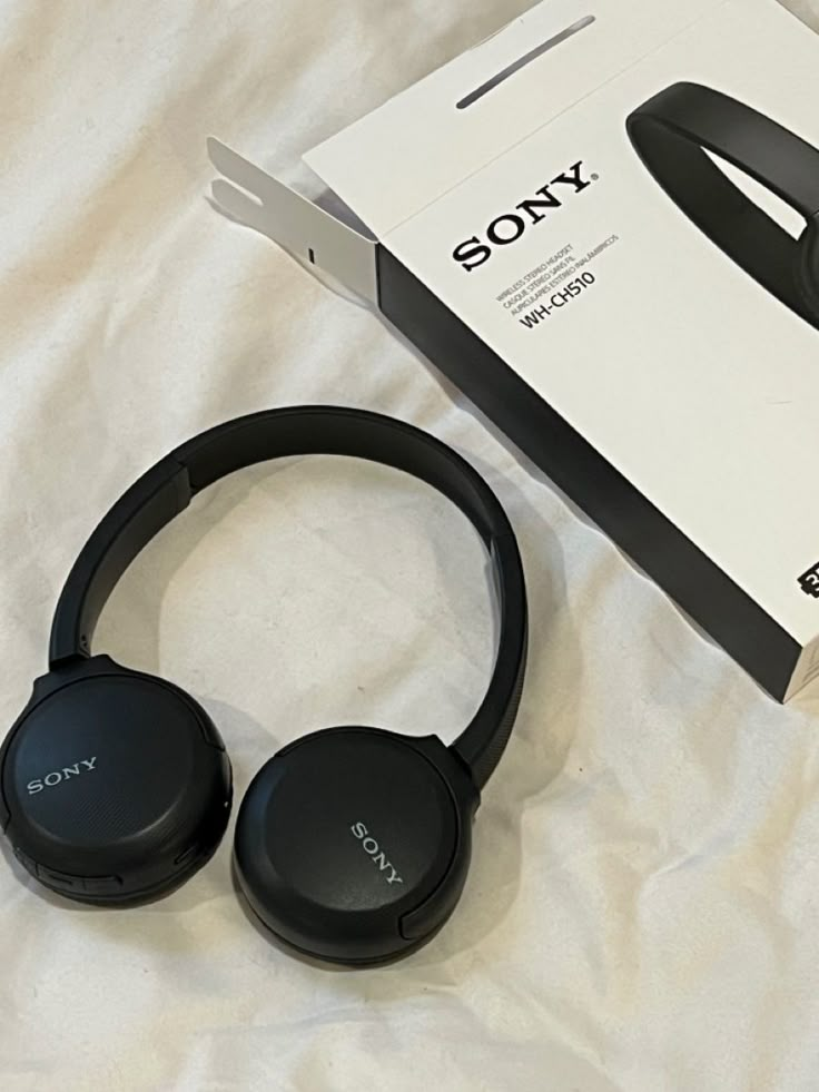 the sony headphones are in its box and ready to be used by someone else