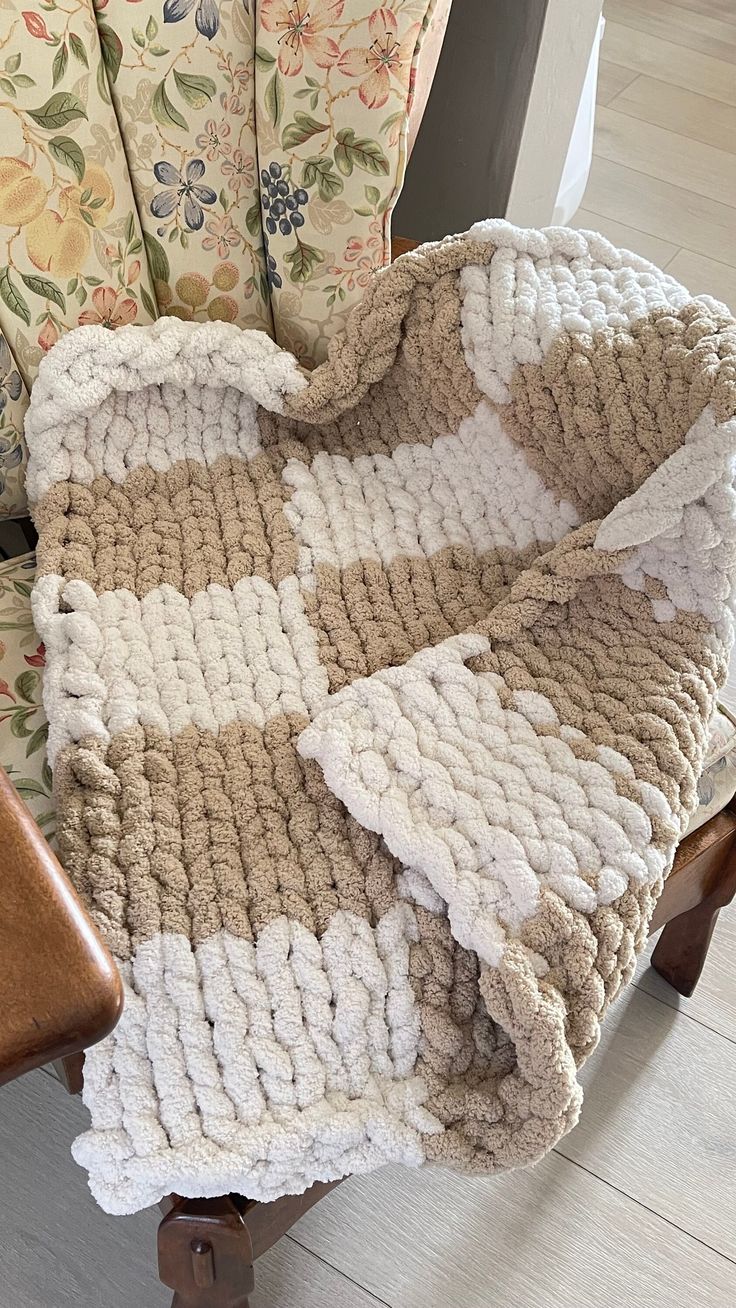 a chair with a blanket on top of it