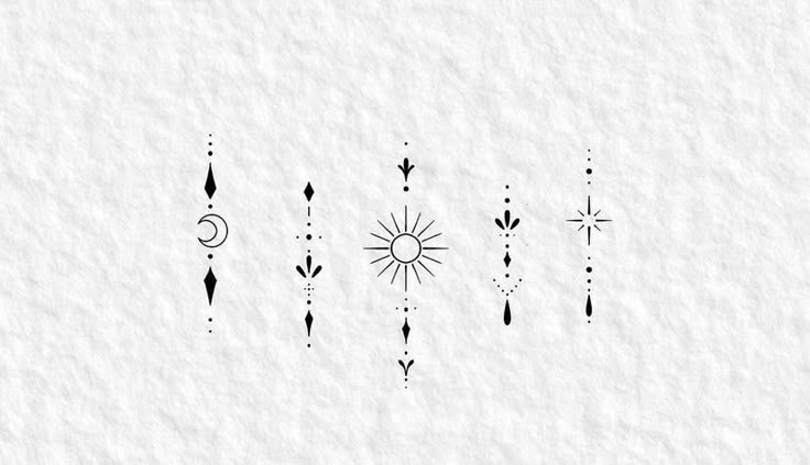 an ink drawing of arrows and stars on white paper with the sun in the background