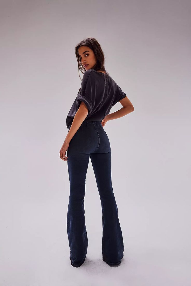 We The Free Jayde Flare Jeans | Free People Dark Wash High Waist Flares For Fall, Dark Wash High-waist Flares For Fall, Casual High Rise Dark Wash Flares, Chic High Waist Denim Blue Flares, Chic High-waist Denim Blue Flares, High Rise Stretch Dark Wash Flares, Dark Wash Flared Hem Flares For Fall, Stretch High Rise Dark Wash Flares, Fall Dark Wash Flared Hem Flares