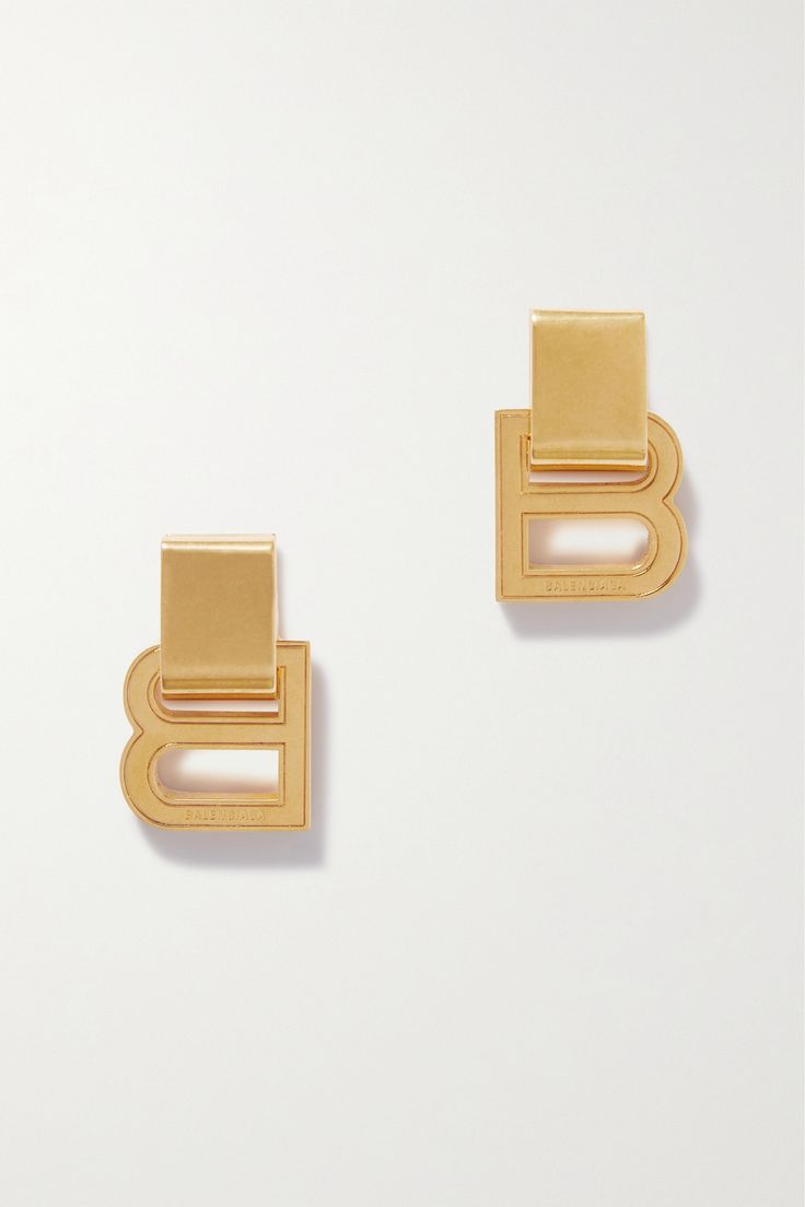 These dangling 'Hourglass' earrings serve as a reminder that 'B' stands for Balenciaga. They've been made in Italy from gold-tone metal and have chunky posts strung with engraved letters. You may recognize them from the Spring '23 runway - they were styled with several looks. Balenciaga Earrings, Balenciaga Jewelry, Earrings In Gold, Fashion Jewelry Earrings, Curator Style, Gold Tone Metal, Earrings Gold, Fashion Watches, Jewellery And Watches