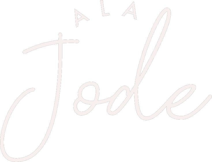 the word la jolie written in white ink on a white background with an inscription that reads