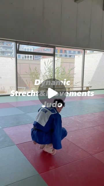 a young boy in blue and white is practicing karate moves on a red mat with the words, dynamic strength & movements studio