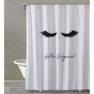 a white shower curtain with eyelashes and the words hello gorgeous